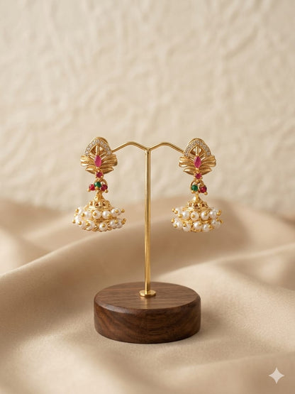 Elegant Gold - Plated Pearl Jhumka Earrings with Ruby & Green Stone Accents | Elegant Traditional Jewellery - Tara Dhara