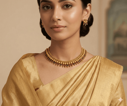Traditional Matte Gold Beaded Necklace Set with Ruby & Green Stones - Tara Dhara